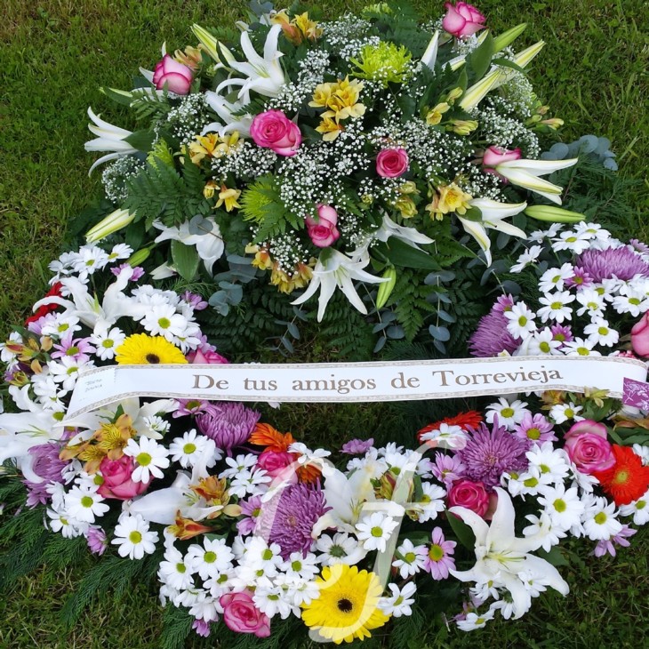 Corona flores variadas con 1 cabezal